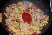 reis mit stäbchen essen