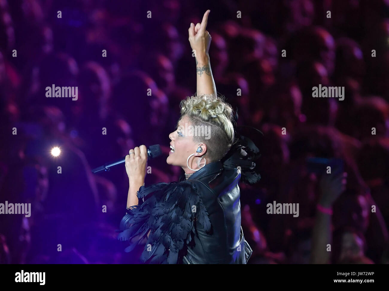 Singer pink performs live on stage hi-res stock photography and images