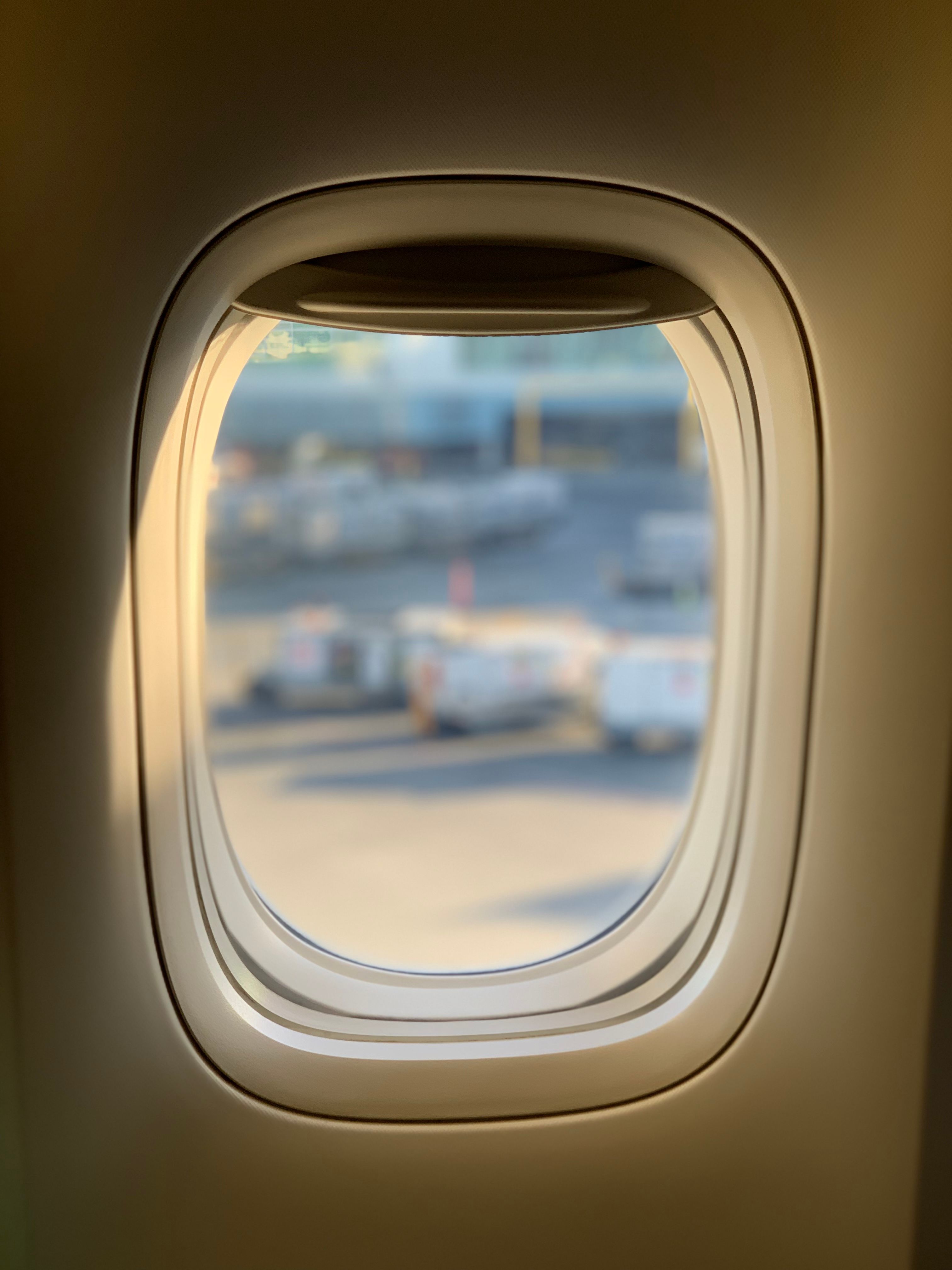 Body of Water View from Airplane Window · Free Stock Photo