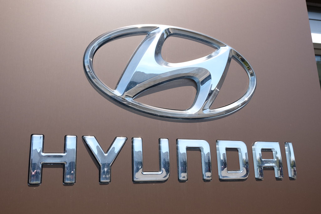  Hyundai logo and name outside a dealership in… 