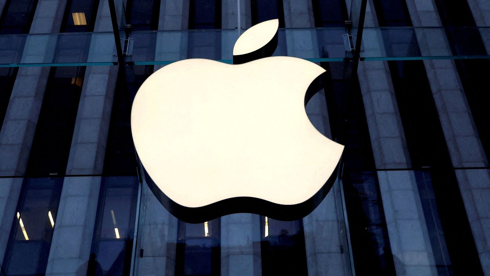 Apple shares climb 0.7%, registering an intra-day record high of $199.