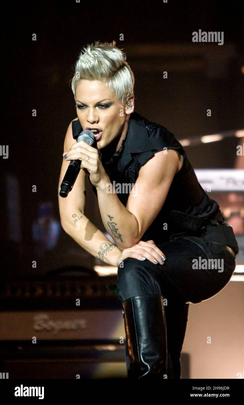 Pop star performing celebrity music on stage singing microphone hi-res