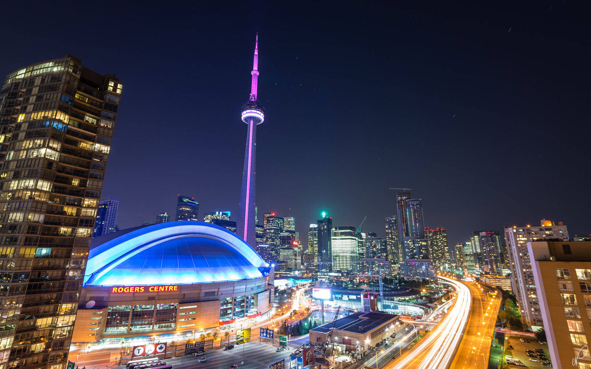  Download Toronto city skyline, illuminated against the night sky Motiv 